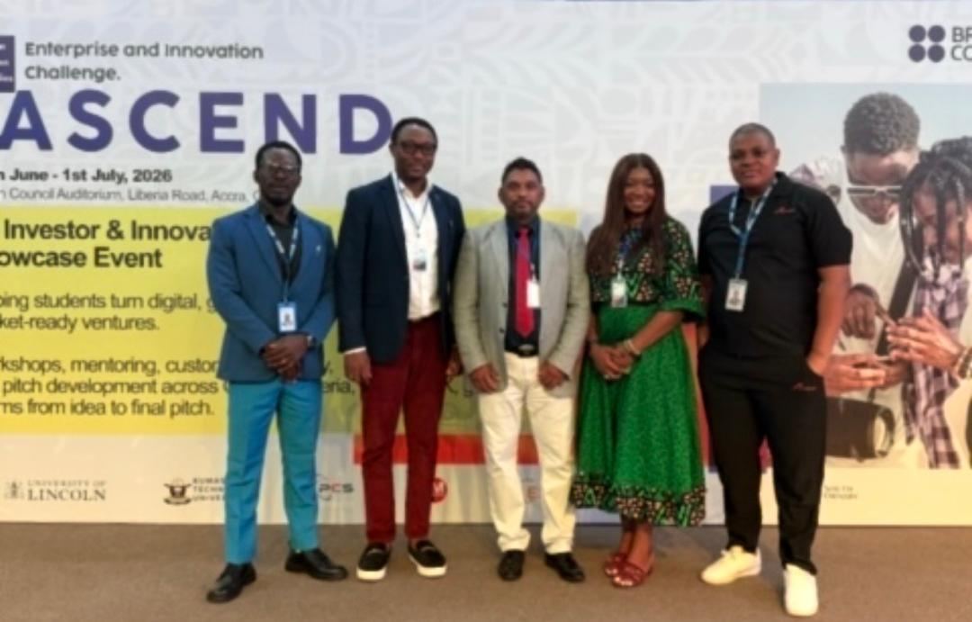 SOLTECH team in front of the ASCEND showcase banner in Accra